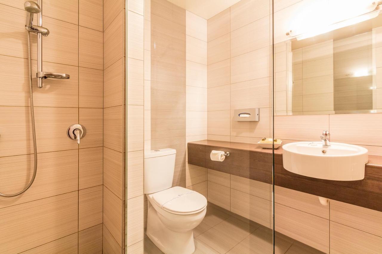 Amethyst Court Motor Lodge Поріруа Номер фото